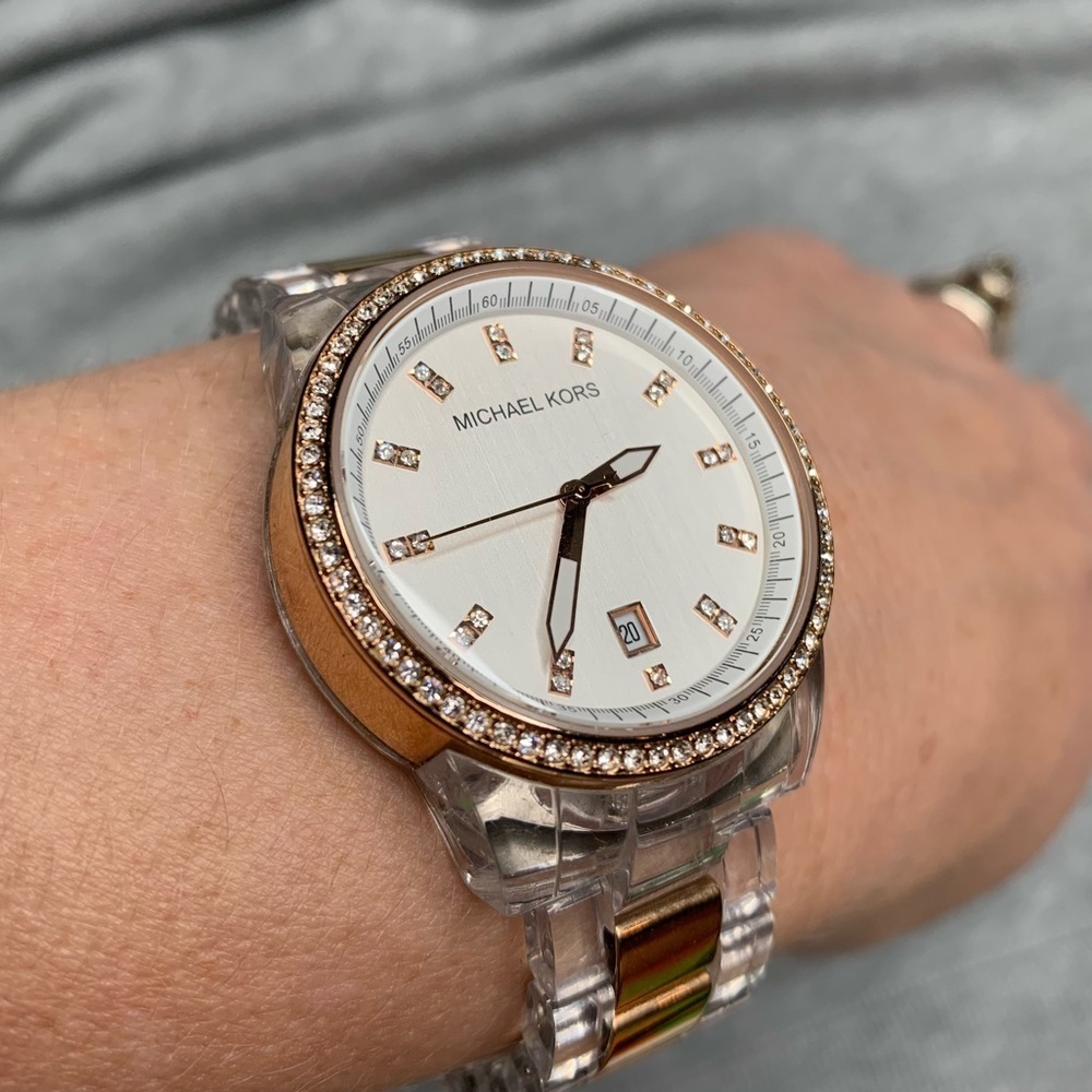 Michael Kors women’s watch with gold accent and rhinestones